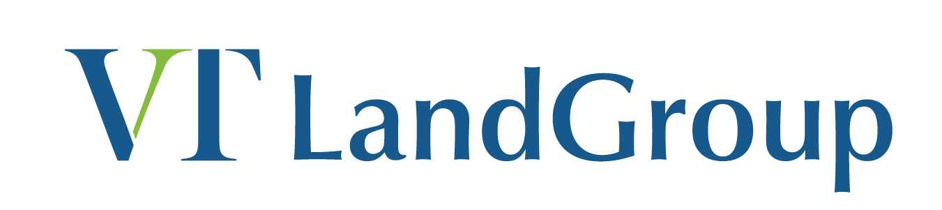 Logo of VT Land Group featuring stylized letters "vt" in green and "landgroup" in blue, about the company's identity.